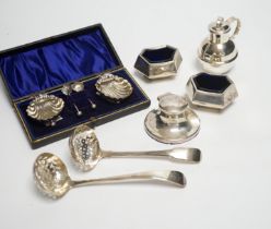 A cased pair of silver salts, one other pair of salts, a Guernsey miniature silver milk jug, an