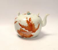A Chinese iron red enamelled globular teapot, 11.5cm