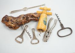 A collection of various corkscrews, bottle openers etc.