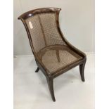 A Regency simulated rosewood bergere chair, width 49cm, depth 48cm, height 83cm