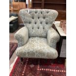 A modern upholstered armchair, width 92cm, depth 70cm, height 110cm