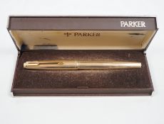 A cased gold plated Parker fountain pen
