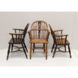 Three 19th century Nottingham area Windsor ash and elm elbow chairs with crinoline stretchers,