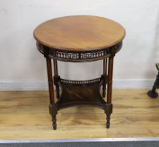 An Edwardian circular two tier centre table, diameter 61cm, height 69cm