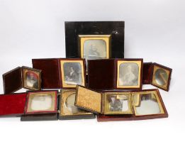 Nine mid 19th century daguerreotype portrait photographs, all mounted in brass, etc. frames, some in