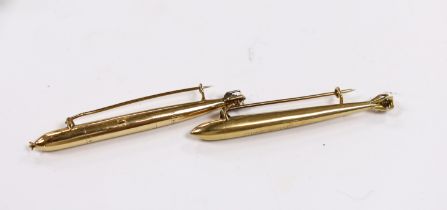 Two early 20th century yellow metal torpedo brooches, one inscribed 'Fiume 1903 Klara', 62mm et