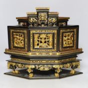 A 20th century Chinese carved lacquered wood altar stand, 49cm wide