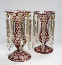 A pair of late 19th century Bohemian ruby flashed glass lustres, 30cm tall