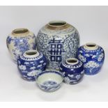 A group of four Chinese blue and white jars and a bowl, together with a similar Japanese jar,