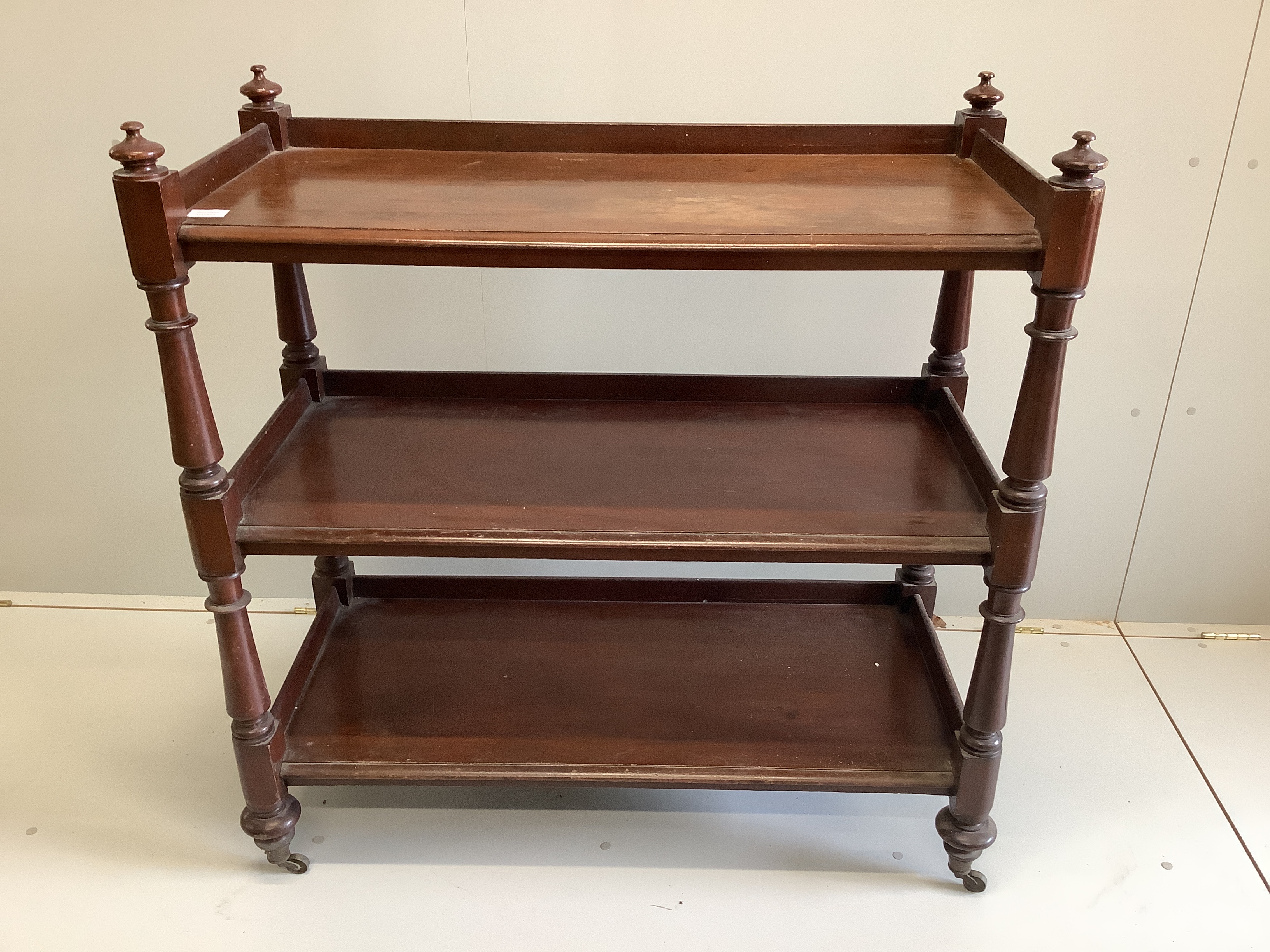 A Victorian mahogany three tier buffet, width 104cm, depth 46cm, height 106cm