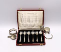 A modern silver caddy spoon, a small Edwardian silver mounted trinket box, a silver vesta case, a