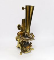 A Ross of London cased 'Wenham's' binocular brass microscope, wooden case with fitted interior and