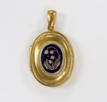 An early 20th century gilt metal and blue enamel set oval locket, with floral motif, overall 48mm,