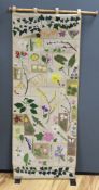 A cross-stitch wall hanging of wildflowers, 140cm high