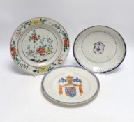 A Chinese famille rose plate together with two armorial or crested dishes, 23cm diameter