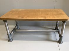 Wolff Olins. An industrial style rectangular table, circa 1970, width 150cm, depth 75cm, height