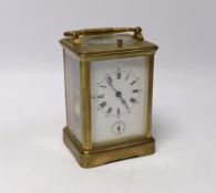 A late 19th century French brass repeating carriage clock, with alarm, 14.5cm high (handle down)