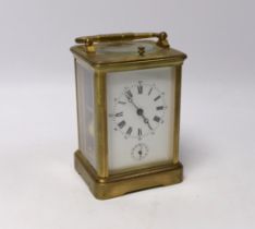 A late 19th century French brass repeating carriage clock, with alarm, 14.5cm high (handle down)