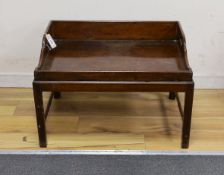 A Victorian rectangular mahogany butler's tray on associated stand, width 69cm, depth 50cm, height