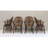 A near set of four 19th century Nottingham area elm, ash and beech Windsor elbow chairs, possibly by