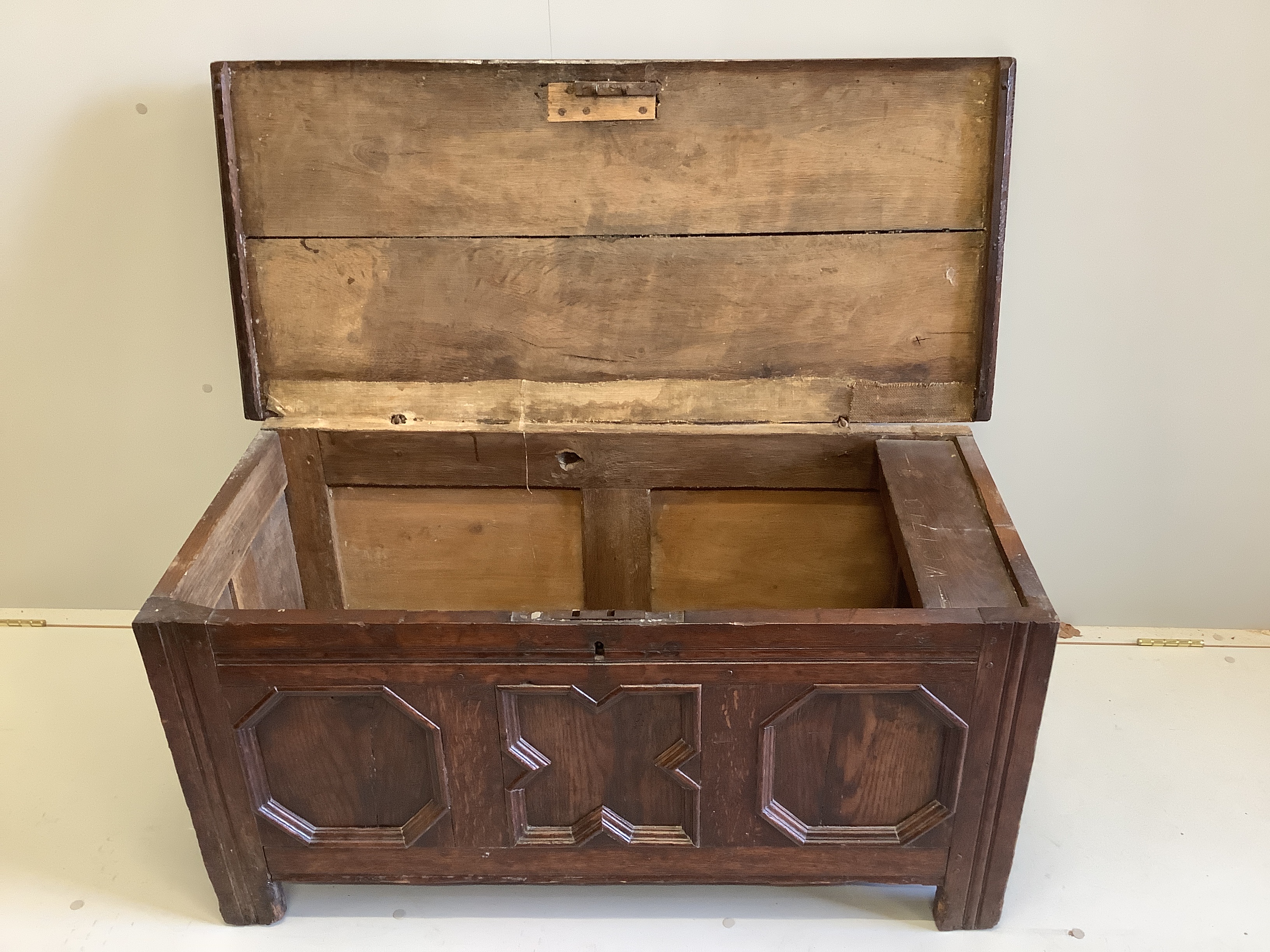 A small 17th century oak coffer with moulded geometric panelled front, width 108cm, depth 49cm, - Image 2 of 3