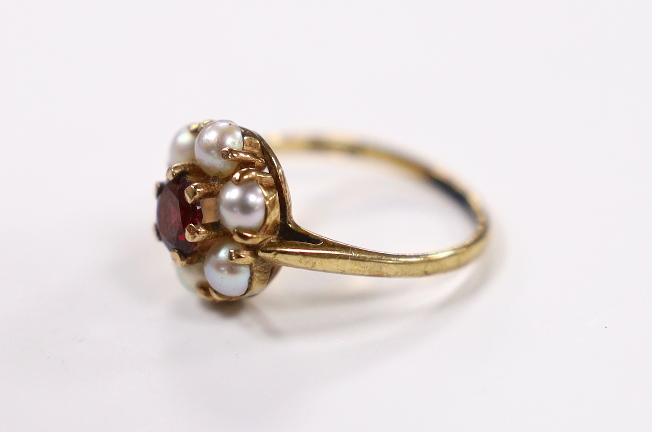 A 9ct gold, garnet and seed pearl cluster set flower head ring, size I, gross weight 2.4 grams. - Image 2 of 3