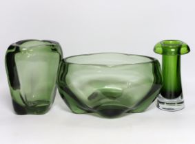 Two Whitefriars green glass vases, designed by James Hogan, and one other, largest 27cm wide