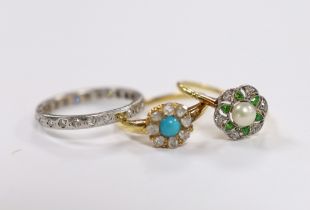 A 1920's yellow metal, cultured pearl, diamond and green garnet cluster set flower head ring, size