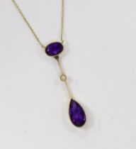 An Edwardian 15ct, two stone amethyst and single stone split peal set drop pendant necklace, overall