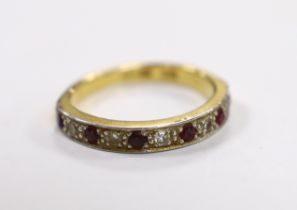A 18ct and plat. six stone ruby and five stone diamond chip set half hoop ring, size L/M, gross