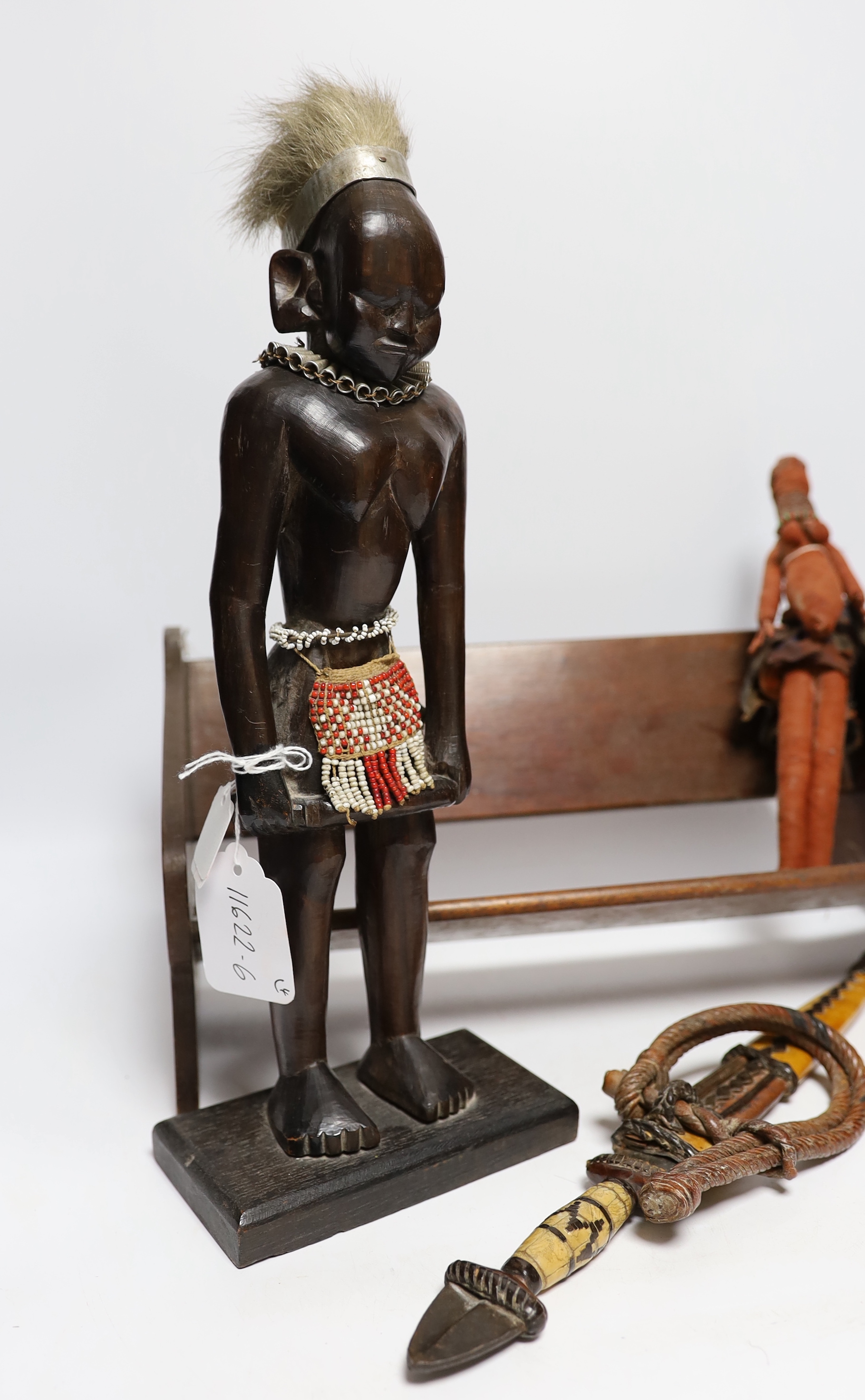 A collection of tribal items including fabric doll, African carved wood figure and dagger, largest - Image 3 of 4