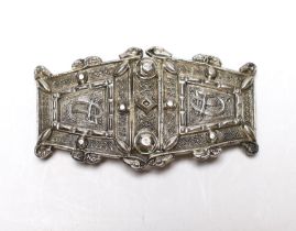 An Edwardian Arts & Crafts Irish silver belt buckle, maker W.P. Dublin, 1905, 7cm.