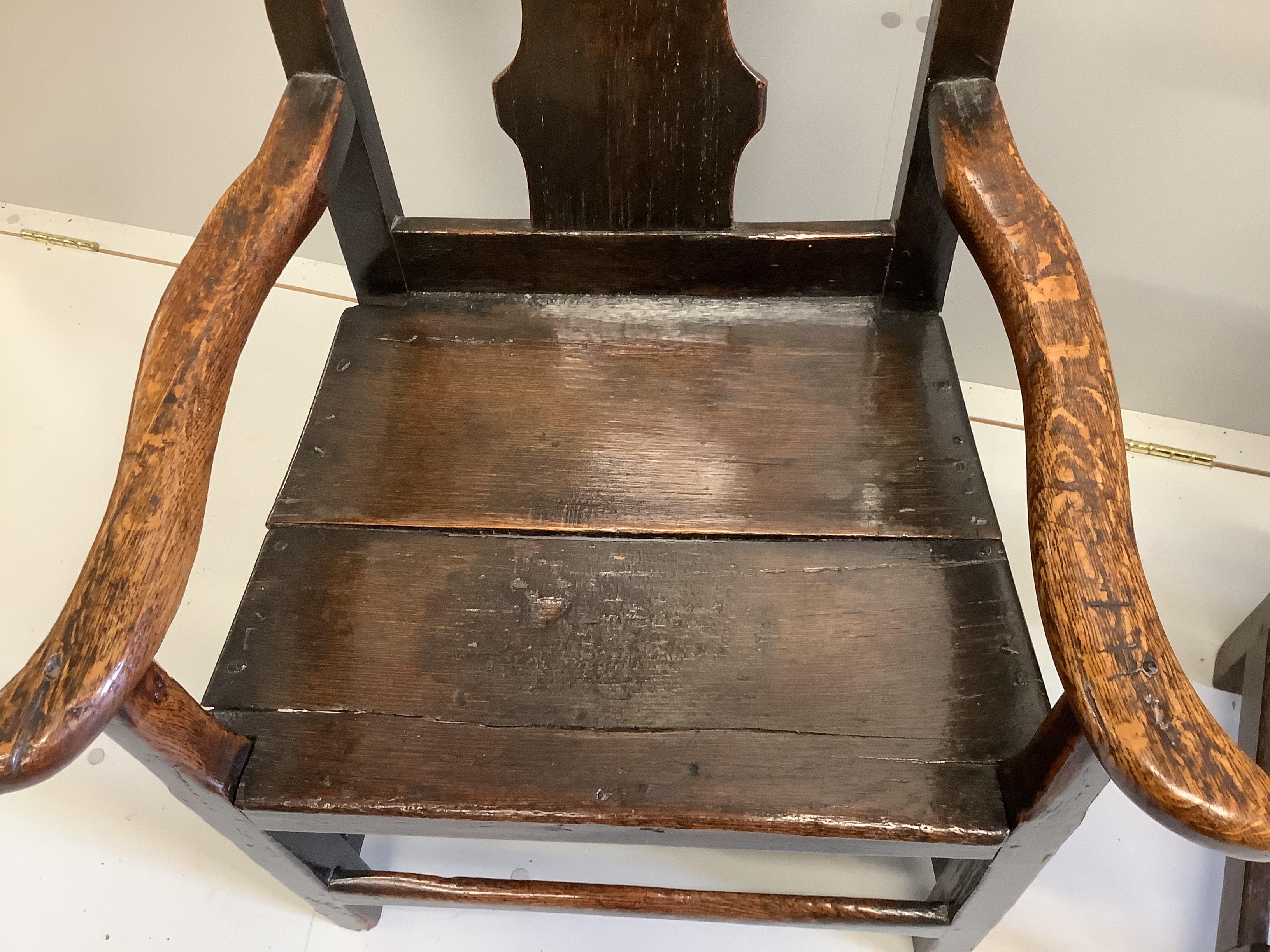 An early 18th century Provincial oak elbow chair, width 61cm, depth 50cm, height 100cm, together - Image 2 of 3