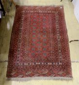 A Bokhara red ground rug, 158 x 124cm