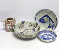 A Chinese famille rose teapot, a bowl and two dishes, bowl 24.5cm diameter