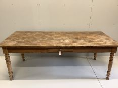 A 19th century French rectangular oak and fruitwood kitchen table, fitted drawer, width 202cm, depth