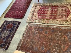 Two antique North West Persian blue ground rugs, a Turkish rug and a Belouch rug, largest 210 x