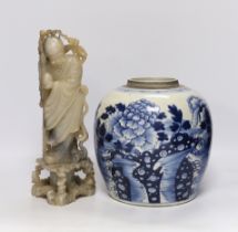 A Chinese blue and white jar and a soapstone figure, 31cm high