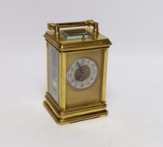 An early 20th century brass repeating carriage clock, 15cm