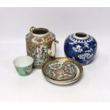 A collection of Chinese ceramics including a blue and white prunus flower jar, a famille rose teapot