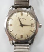 A gentleman's stainless steel Favre Leuba Daymatic manual wind wrist watch, on associated flexible