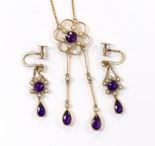 An Edwardian yellow metal, amethyst and seed pearl cluster set drop pendant necklace, 48cm and a
