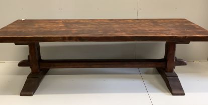 An 18th century style French rectangular oak refectory dining table, width 249cm, depth 87cm, height