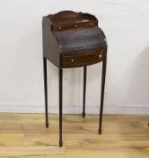 A small Edwardian mahogany Sheraton Revival bowfront tambour desk, width 38cm, depth 35cm, height
