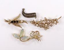 Three assorted modern 9ct and gem set foliate brooches, including garnet, seed pearl and jelly opal,