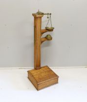 A Youngs of Bear St. London Victorian brass mounted oak personal weighing scales with incorporated