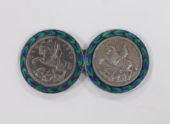A 1930's white metal and two colour enamelled mounted twin 1933 crown coin belt buckle, stamped '