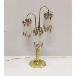 A contemporary brass and perspex three branch table lamp, height 91cm