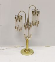 A contemporary brass and perspex three branch table lamp, height 91cm