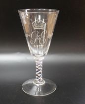 A large George VI commemorative trumpet goblet with etched glass design and cypher dated 1937,